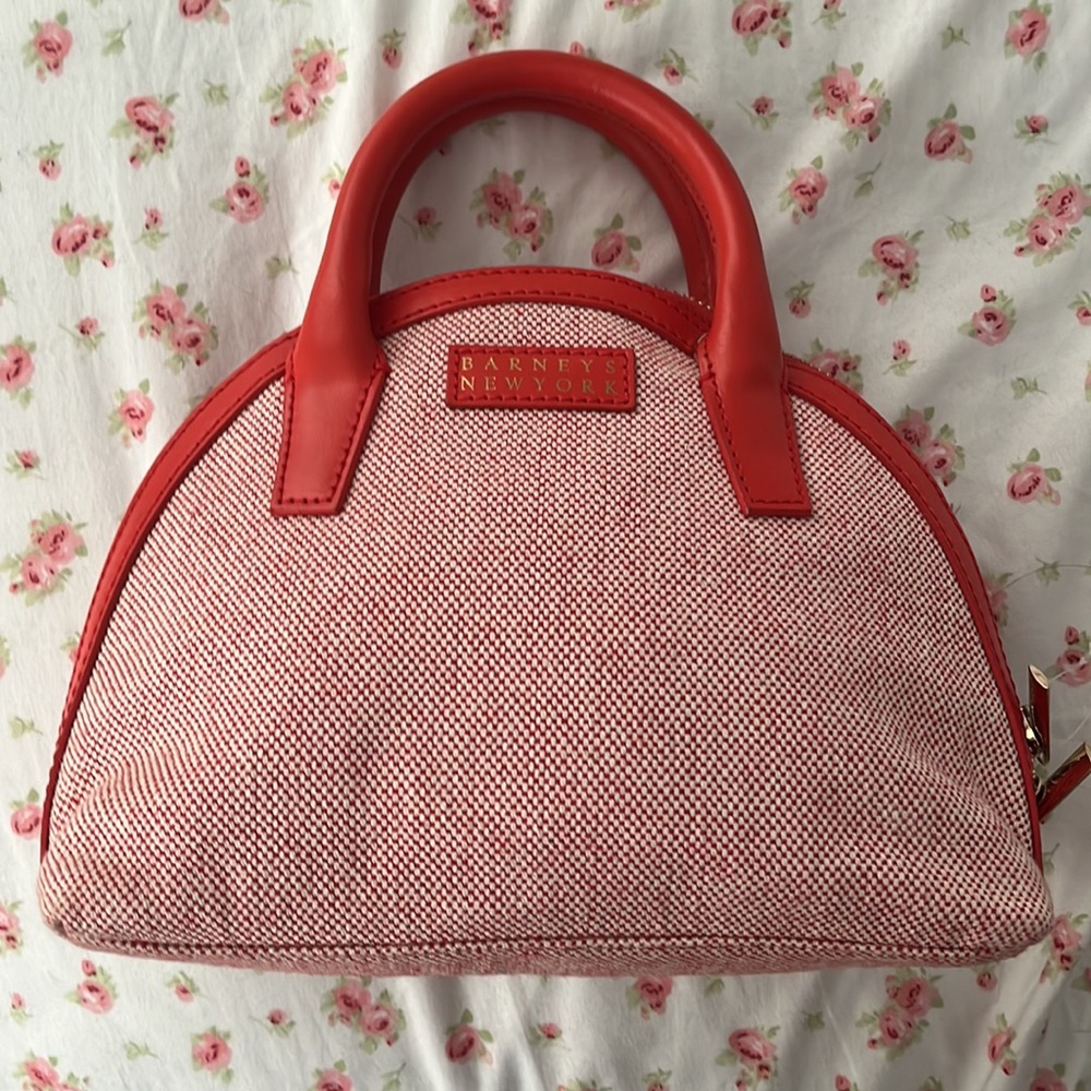 Beautiful barney’s new york red bag with long attachment to wear around neck
